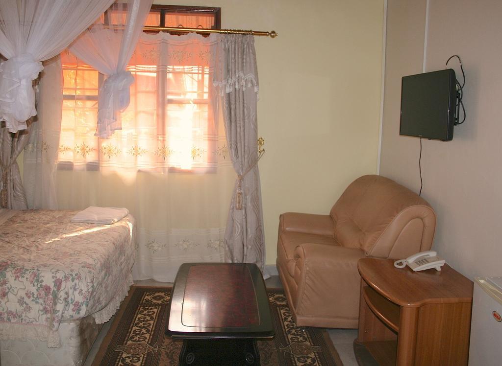 Hotel Acacia Kampala Chambre photo